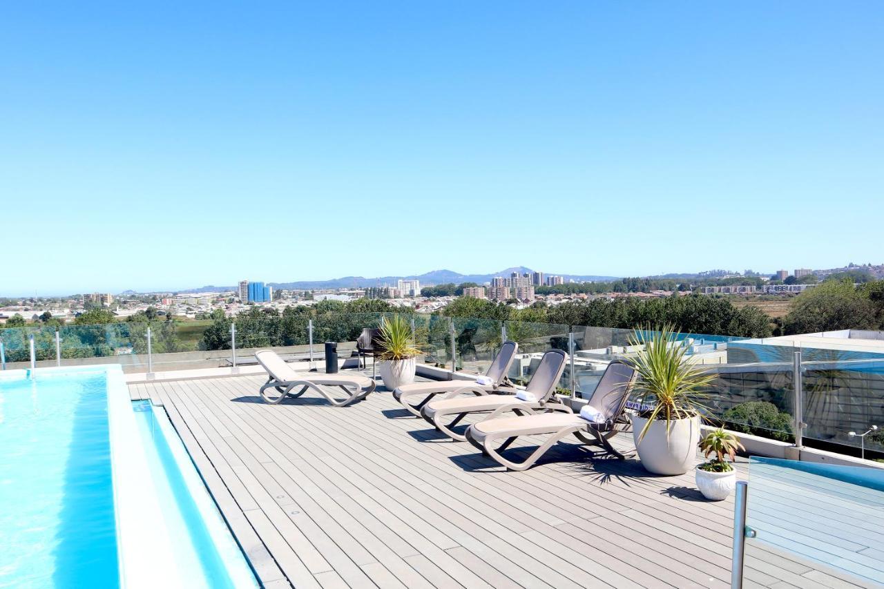 康塞普西翁佩特拉温德姆酒店 外观 照片 Rooftop pool at the Hotel Indigo San Diego